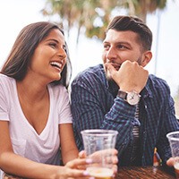 couple smiling and looking at each other