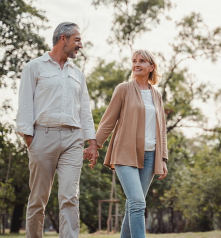 couple strolling in park