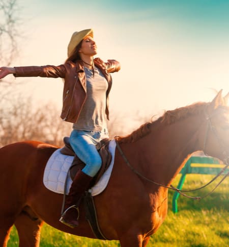 woman riding a horse
