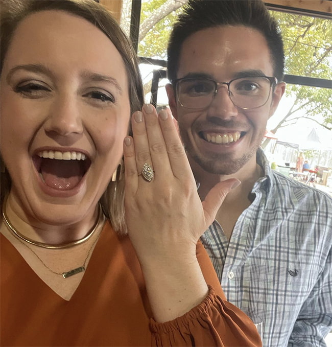 Our friend Kylie showing off her engagement ring excitedly