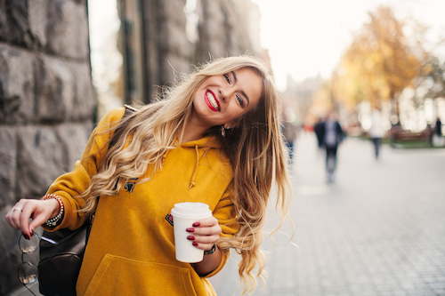 young female in the city happy with her lasik vision