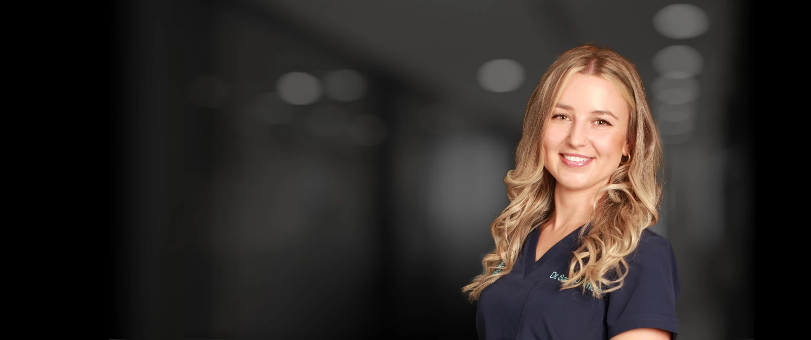 dr sarah damore black banner